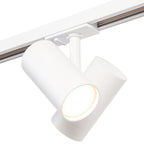 Witte draaibare spot met warme lichtopening op een rail