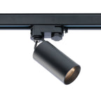 Zwarte 3-fase railspot met cilindrische LED-kop aan zwarte rail